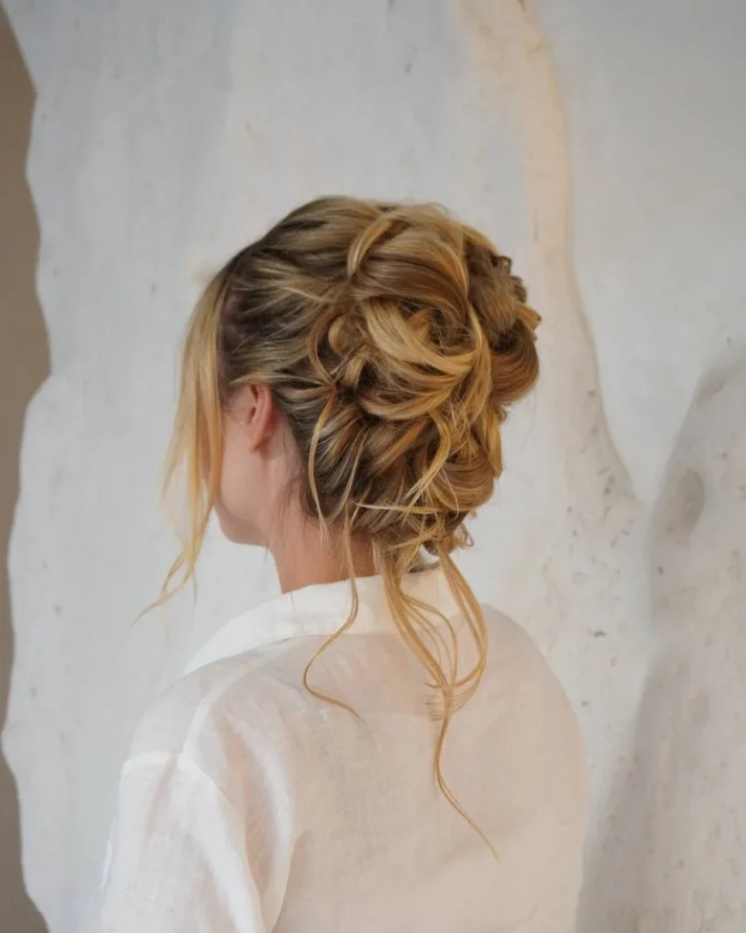 Textured bridal updo by Milfey Beauty hair stylists